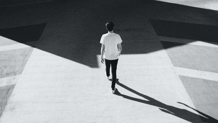 A senior woman taking an evening walk