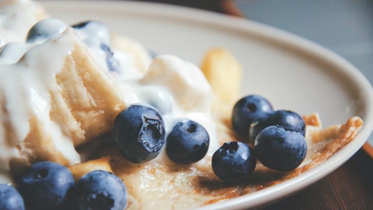 A picture of oatmeal with fruits